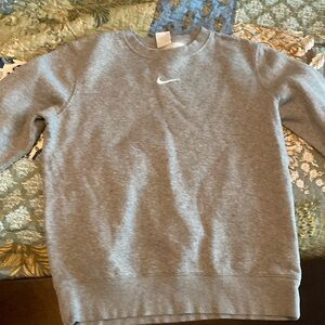 Nike small gray sweatshirt with swoosh on the front